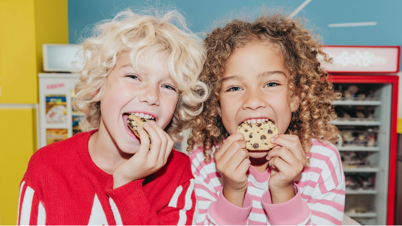 Kids enjoying Nicely Made cookies
